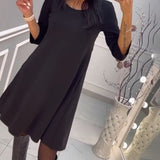 Robe unie avec nœud au dos
