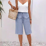 Pantalon mi-long décontracté avec poche de couleur unie