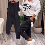 Pantalon décontracté de couleur unie avec poche
