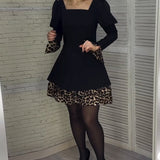 Robe élégante à manches bouffantes et imprimé léopard