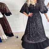 Robe élégante à col en V et demi-manches