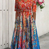 Robe de villégiature imprimée avec poches et col en V