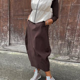 Robe élégante simple à manches longues avec poche de couleur unie