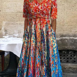 Robe de villégiature imprimée avec poches et col en V