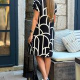 Robe midi imprimée à manches courtes et ligne de revers
