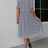 Robe élégante à col rond et imprimé floral