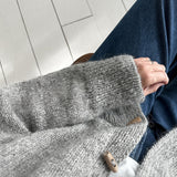 Cardigan uni à col montant et boutons en corne