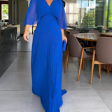 Robe à plis et taille cintrée