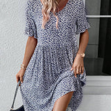 Robe élégante à col rond et imprimé floral
