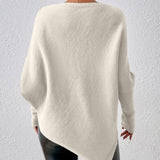 Pull uni à ourlet irrégulier