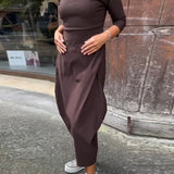 Robe élégante simple à manches longues avec poche de couleur unie