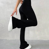 Pantalon slim micro-évasé uni