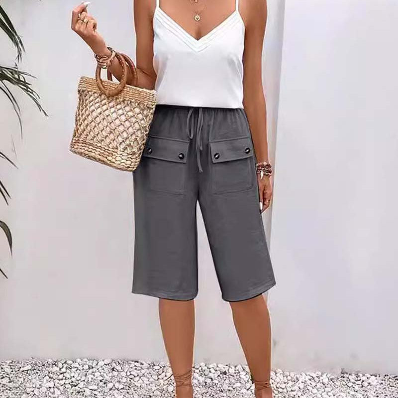 Pantalon mi-long décontracté avec poche de couleur unie