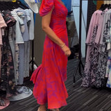 Robe imprimée fendue plissée