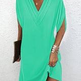 Robe élégante à manches fendues de couleur unie